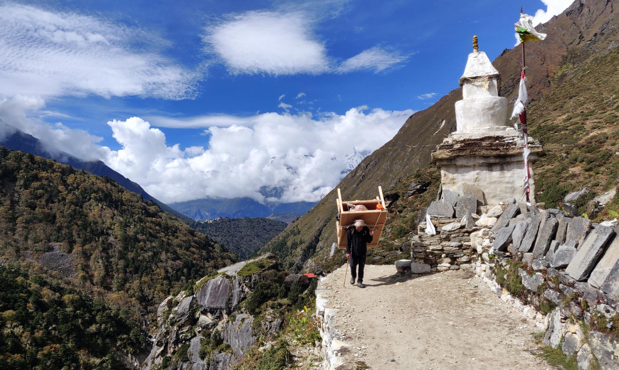 Never complain about the weight of your backpack! Image